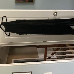 Beautiful black maxi dress. Halter type top pleated bottom